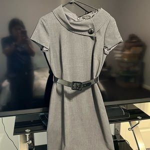 Size 8 short sleeves Tahari dress with black belt.